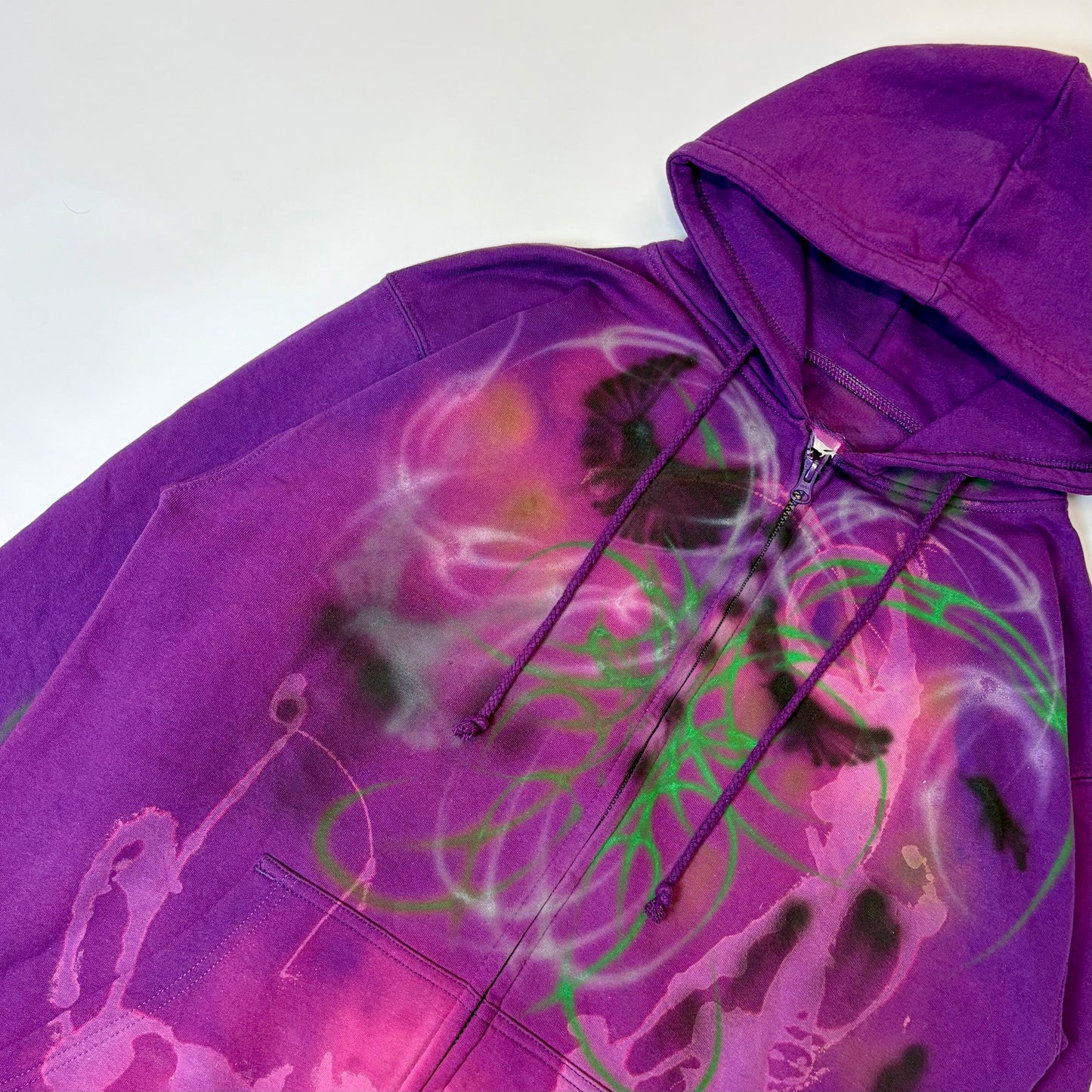 “Green gates; purple doves” zip-up